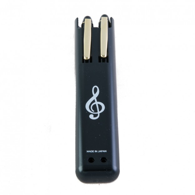 Black ballpoint pen and mechanical pencil treble clef