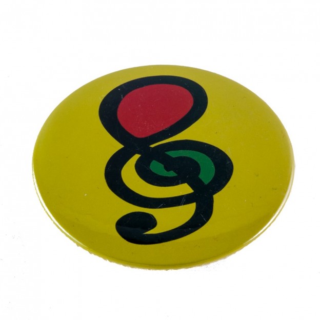 Yellow treble clef badge