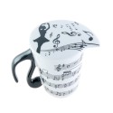 Tasse en porcelaine avec couvercle (table d'harmonie), partition et danseuse