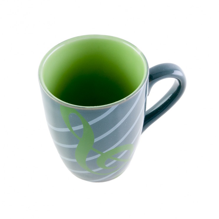 Tasse verte en porcelaine avec clé de sol
